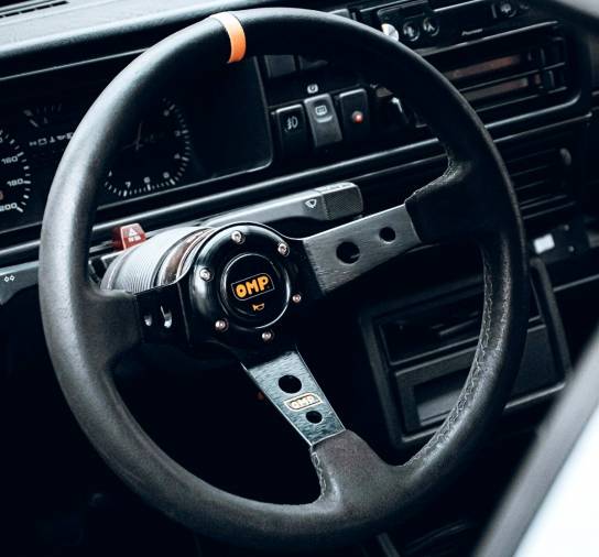 Modern day steering wheels are multifunctional, whereas earlier ones have purity of purpose and only steer a car. Which is your type?