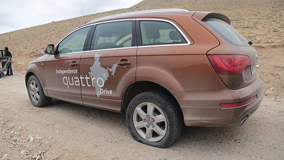 A sharp stone had managed to slice the Q7 tyre