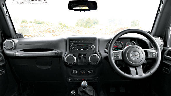 For a dedicated off-roader, interiors are well-appointed. There's climate control, a multifunctional steering wheel and a decent stereo