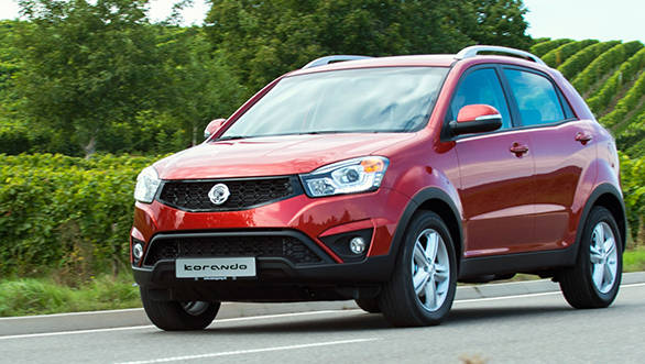 Notice the black mesh radiator grille, new headlights and a wider, low level air intake