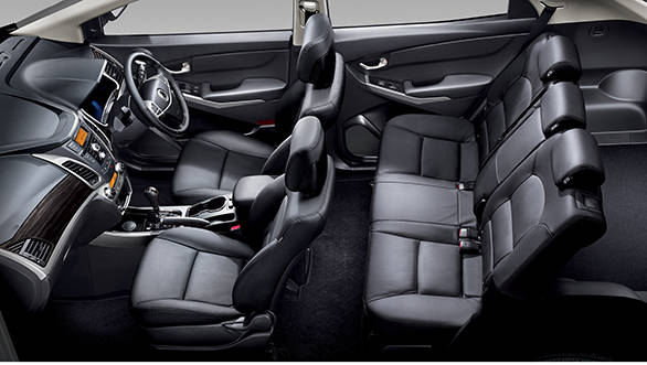 There is abundant storage space that includes enlarged cup holders, a mobile phone tray and flip-down sunglasses tray