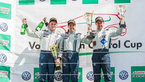 Jeffrey Kruger (left) with race winner Marcus Fluch and third-placed Maciej Steinhof on the podium