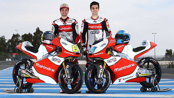 Miguel Oliveira and Arthur Sissis of Mahindra Racing with their bikes