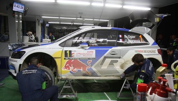 And with only 32 seconds gone by, the car is jacked up and a tyre removed already!