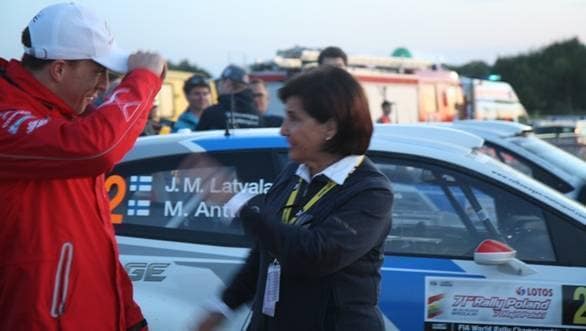 Rally legend Michelle Mouton wags her finger at Kris Meeke, who appears to doff his hat at her and promise to improve on his current third position in the rally