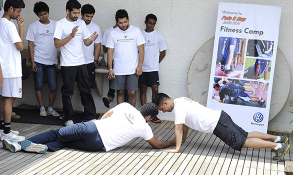 Compressed--Volkswagen-Race-Polo-drivers-doing-pushups