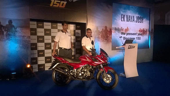 Rajiv Bajaj and Eric Vaz, president, motorcycle business, Bajaj pose with the new Discover F150