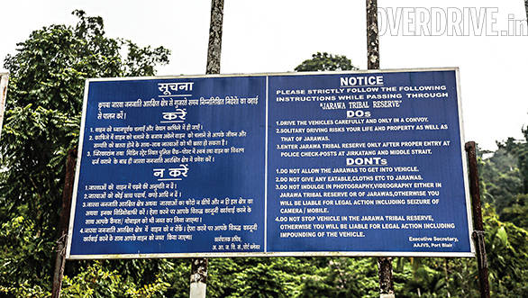  A signboard that warns travellers of the dos and don'ts within the Jarawa tribal regions