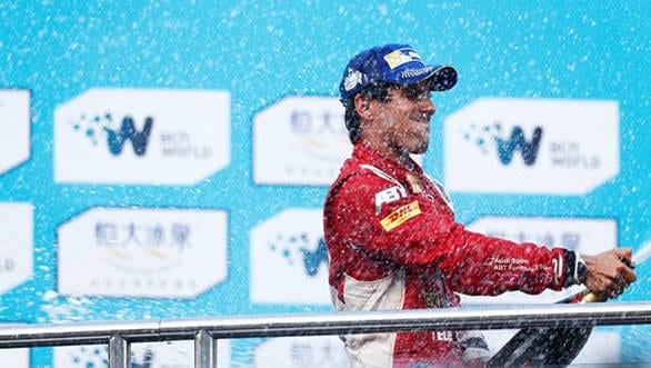 Lucas di Grassi celebrates after winning the first ever Formula E race at Beijing