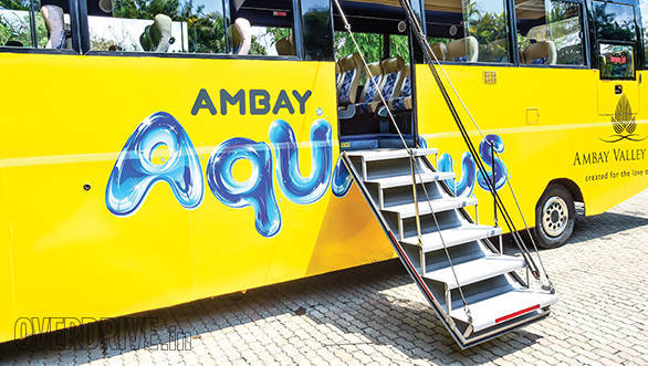 The drawbridge style stairs are the first clue that this is not an ordinary bus