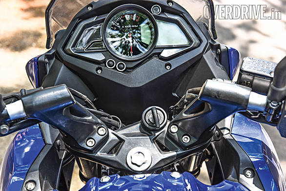 Tall bars on massive risers, footpegs tucked not too far back and a tall screen give the AS 200 excellent ergonomics for hours of riding
