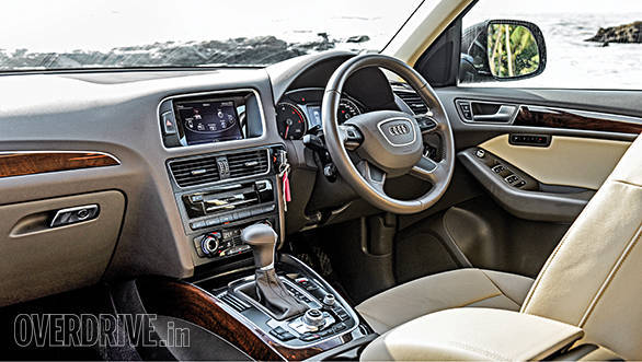 The Audi Q5's cabin is airy, spacious and is the best of this lot to be ferried in
