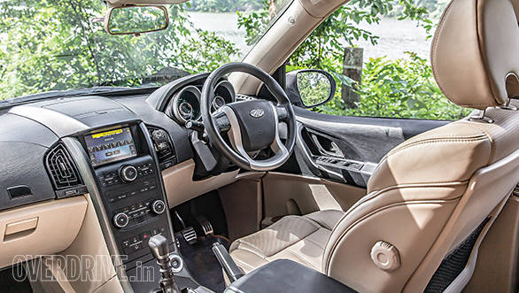 XUV500 gets updated interior that features a new dual-tone dashboard and soothing blue lighting. Quality has improved but still not on par with rivals. Twin-pod dials look funky