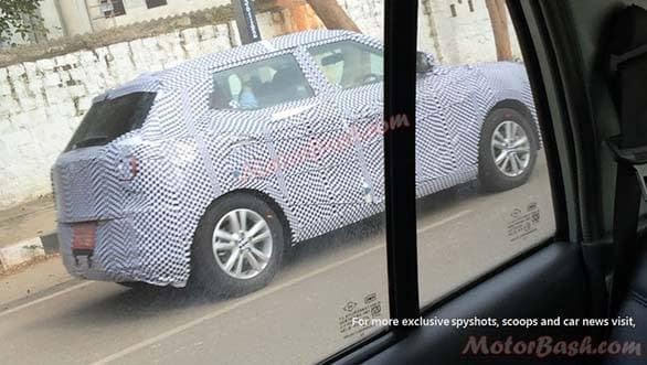 The Tivoli spotted here appears to be heavily loaded and undergoing suspension testing