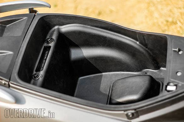 The Jupiter's boot has a smaller intrusion and has a provision for a mobile charger. This charger itself is not offered as standard 