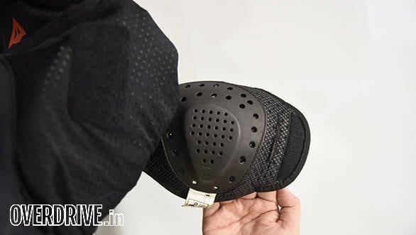 Sculpted shoulder protectors attach to the jacket via velcro and fit perfectly