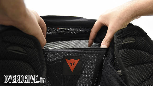 The back protector pocket ships empty. You'll have to buy an optional back protector