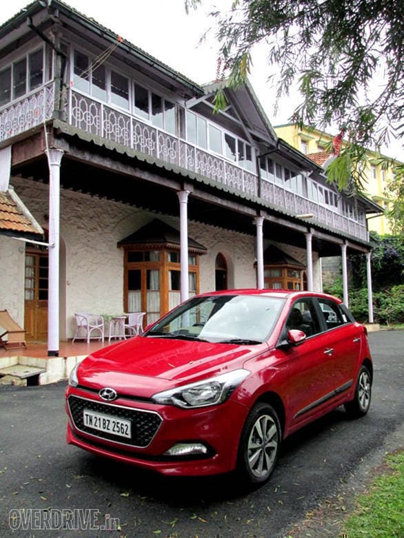 Our wheels outside our cottage at the Ootacamund Club