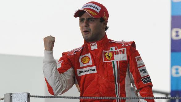 Felipe Massa celebrates his win at the 2008 Brazilian GP, while also bravely trying to hold back tears after losing the title by one point