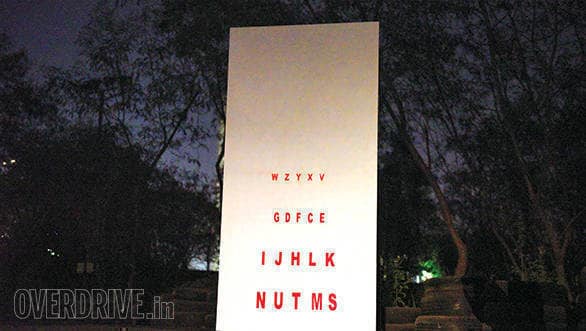 The standee we had set up had random alphabets of different sizes pasted onto it