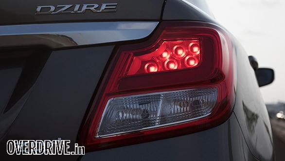 The circular detailing within the Maruti Suzuki Dzire's taillight is a smart and premium touch