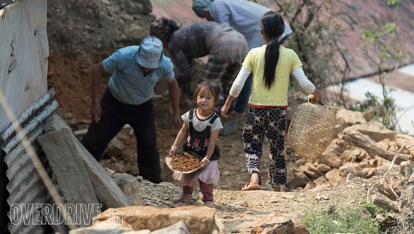 This little girl in Kohnoma was super excited to help her family members. Sweet!!