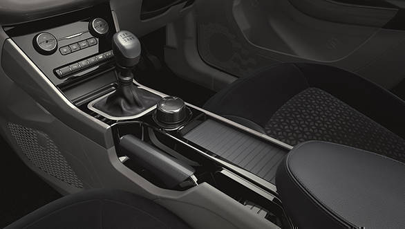 This is the sliding cup holder mechanism in the new Tata Nexon